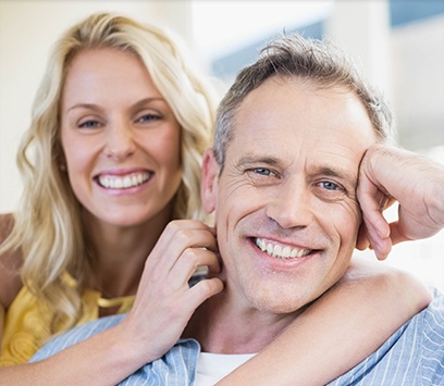 Couple smiling outdoors